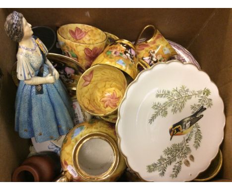 A part gilt Atchin Tan tea service with traveler decoration together with a collectible 'Queen Elizabeth the Queen Mother' ce