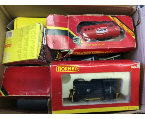 Lot to include a selection of Hornby model train carriages, trucks and an engine.