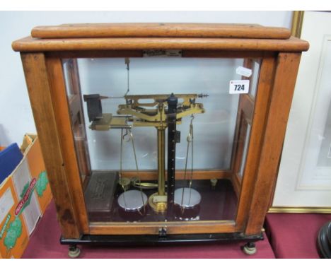 Set of Oertling Balance Scales, model 101, in glazed display case, together with bakelite cased W&J George Wrights. 