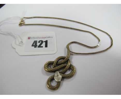 Lalique; A Modern Serpent Pendant, stamped "Lalique", on a 9ct gold chain. 