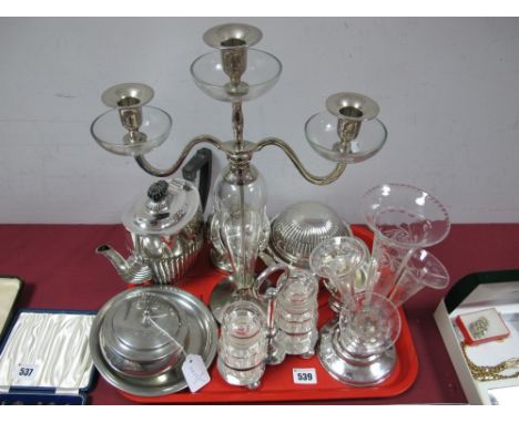 An Epergne, with glass flutes (damaged), modern twin branch candelabrum, roll top butter dish, trinket box, pickle jars on st