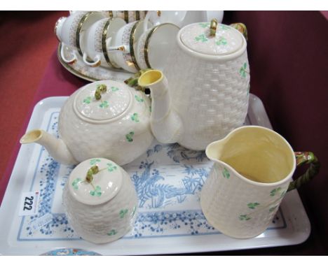 Belleek Pottery Four Piece Tea Service, comprising teapot, hot water jug, cream jug and sugar hive, all with green backstamps