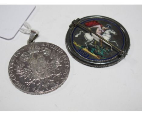 1821 Enamel 'Coin', as a brooch; together with a thaler. (2) 