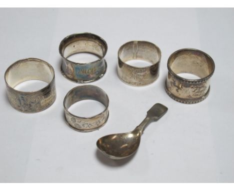 Five Hallmarked Silver Napkin Rings, and a caddy spoon. (6) 