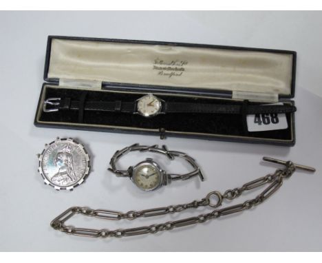 A Queen Victoria Double Florin, 1887 mounted as a brooch, together with an Albert chain, Helvetia and another ladies wristwat