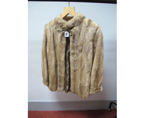 A Blonde Mink Jacket, collarless design with leather bow trim at neck and split sleeve cuffs, retailed by "Joseph Fox Furrier
