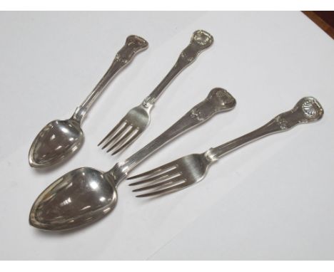 An Irish Hallmarked Silver Table Spoon, Dublin 1825, together with matching smaller spoon and a similar table fork and anothe