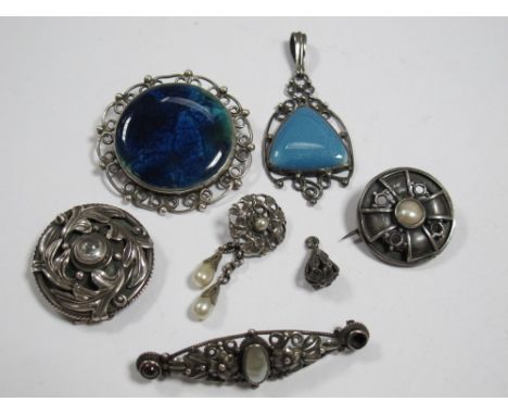 A Ruskin Style Ceramic Panel Brooch, circular collet set, within openwork frame, stamped "A.E.S"; together with a pendant, st