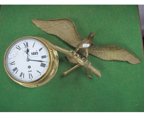 Sestrel Brass Ships Clock, white dial, Roman numerals, together with a brass Kestrel on a branch. (2)