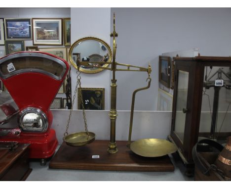 A Large Set of Brass Victorian Shop Scales and Weights, with ornate Arts &amp; Crafts design finial on mahogany base, 53.5cm 