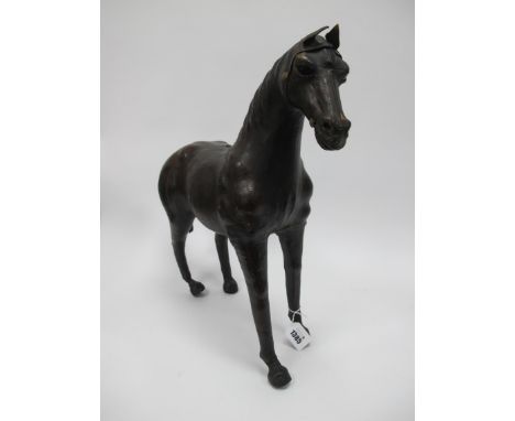 A Leather Covered Model of a Horse, 47cm high. [412737]