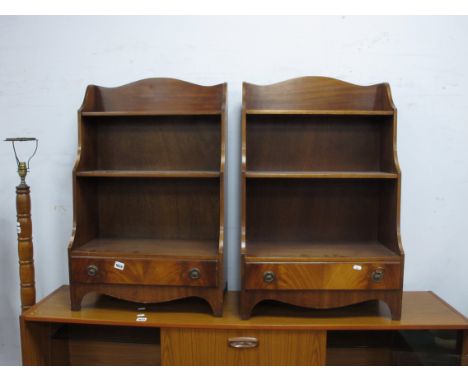 A Small Pair of XX Century Mahogany Waterfall Bookcases, with shaped tops, three shelves, over a single drawer, bracket feet 