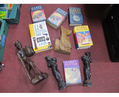 Wooden Aboriginal Figures,with a collection of J.K Rowling Harry Potter books:- One Tray,