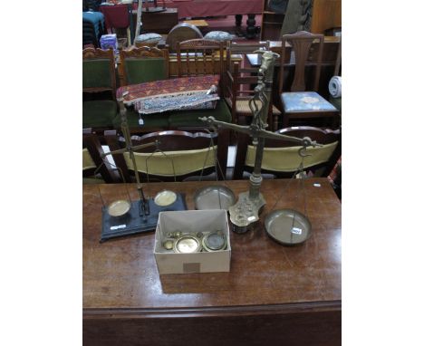 A Set of Early XX Century Brass Balance Scales, featuring a bull's head finial plus all fitted weights to base; another set o