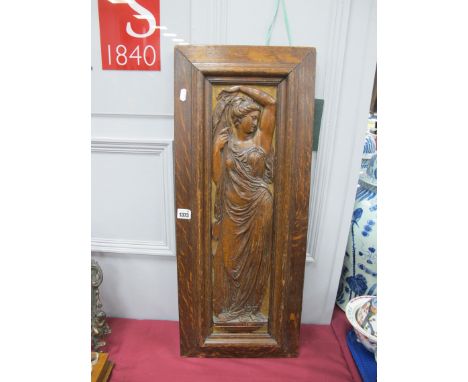 XIX Century Oak Wall Panel, carved with maiden, her left arm aloft, 76 x 31cm.