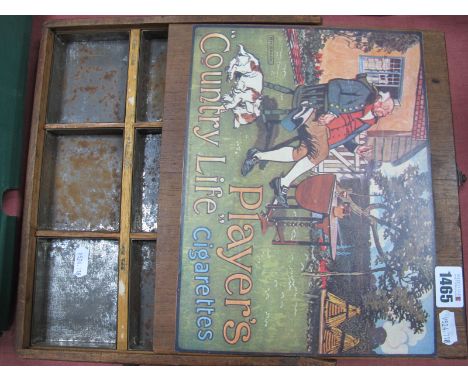 An Early XX Century Travelling Salesman's Sample Case, with nine internal tin trays, a sliding top featuring later 'Player's 