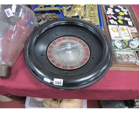 A Large Chad Valley Black Bakelite Roulette Wheel (38.5cm diameter).