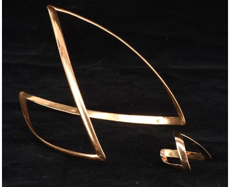 Wishbone bangle and matching wishbone ring, size I, bangle measures 93x65mm, both tested as 14 ct Condition Report:  gross we
