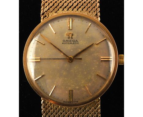 Omega a Gentleman's gold wristwatch,the signed dial with baton hour markers and centre seconds, fitted with a signed calibre 