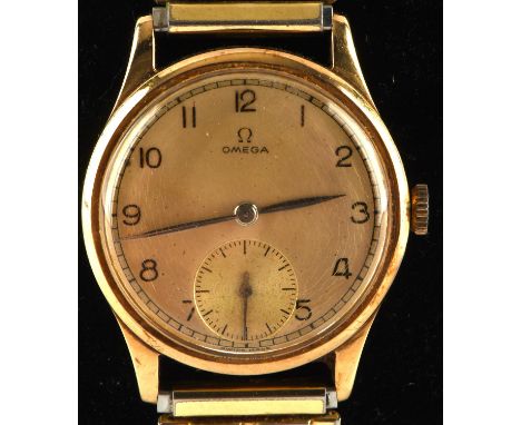 Omega a gentleman's gold wristwatch, circular gold bezel, signed dial with Arabic numeral hour markers within a minute track,