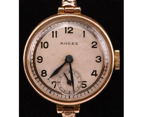 Rolex, A Ladies reference 389 Gold wristwatch,the signed circular dial with Arabic numeral hour markers within a minute track