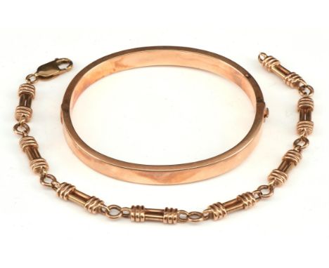 Fancy link bracelet with lobster clasp, 19 cm long, stamped 9 ct with a hinged bangle 58mm in diameter. tested as 9 ct Condit