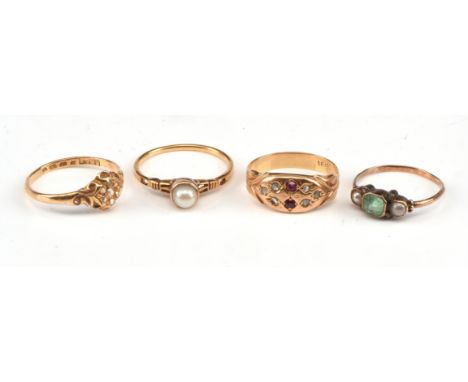 Four antique rings, including a rose cut diamond and ruby gypsy set ring, stamped 18 ct size K, a rose cut diamond set in a s