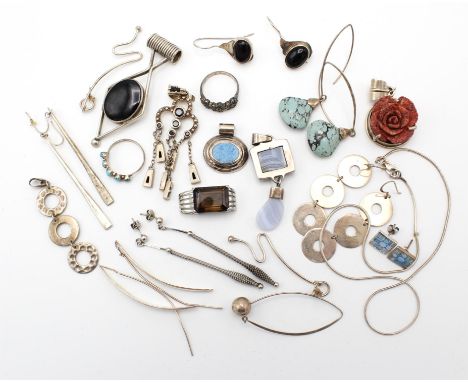 A group of mainly modern silver jewellery, including a blue lace agate two tiered pendant, a silver geometric design onyx pen