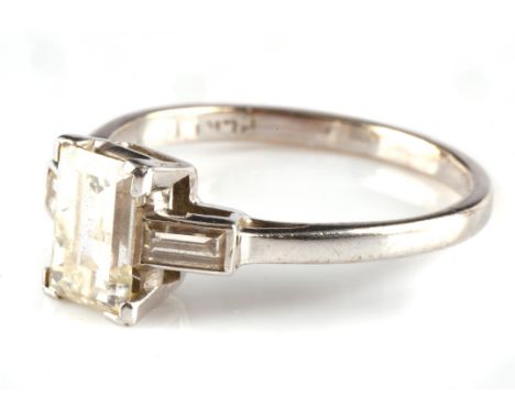 Modern baguette cut diamond ring with baguette cut set in shoulders, mount stamped platinum, estimated weight 1.27 carats, ri