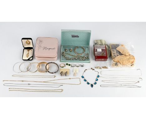 A group of silver costume Jewellery, including a 9 ct gold elephant pendant and chain 22cm long, an oval nephrite jade pendan