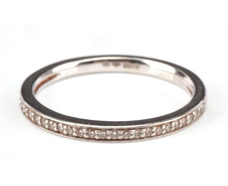 Diamond half eternity ring, set with brilliant cut diamond in a millegrain setting, stamped platinum, ring size K 1/2 Conditi