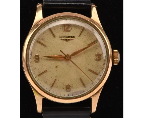 Longines A gentleman's gold wristwatch, the signed dial with baton and Arabic numeral hour markers, fitted with a signed 17 j