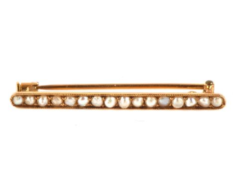 Seed pearl bar brooch, 33x2mm with tube lock fastening, tested as 18 ct in Asprey box, circa 1900 Condition Report:  gross we