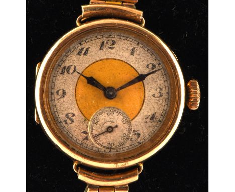 Gold wristwatch, round dial with Arabic numerals and minute track, manual wind movement, the case stamped 9 ct with a gold-pl