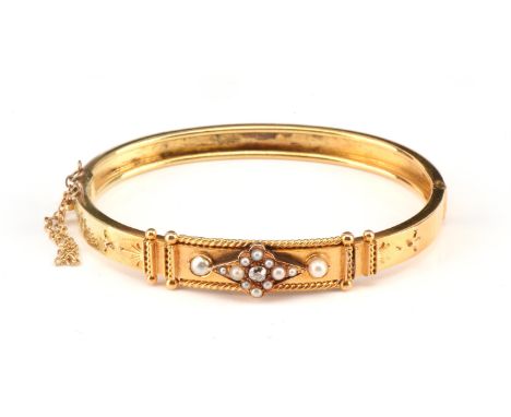 Old cut diamond and pearl set bangle with rope work design, concealed clasp and safety chain 60mm in diameter, tested as 18 c