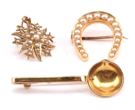 Three antique items, including a seed pearl star pendant stamped 15 ct, 27mm in diameter, a pearl horseshoe brooch with c cat