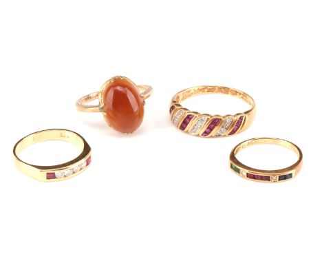 Four gem set rings, including a ruby and diamond wave style ring, size S,  with a sapphire, ruby and emerald half hoop ring, 