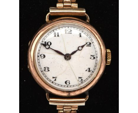 Two gold cased wristwatches, both manual wind movements with Roman numerals with train track markers, stamped 9 ct with base 