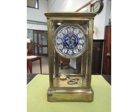 A brass four-glass mantel clock, beveled glass panels, French movement with logo for Victor Reclus, regulator. 4 1/2 enamel d