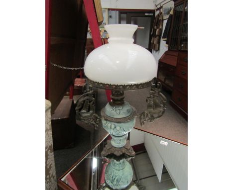 A Victorian ceramic oil lamp with scenes of Putto and galleons 