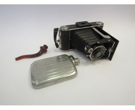 A cased Kodak Junior 620 camera, a 4oz hip flask and a cased pipe, possibly for opium 