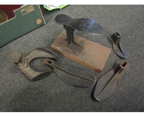 A collection of vintage cobblers tools 