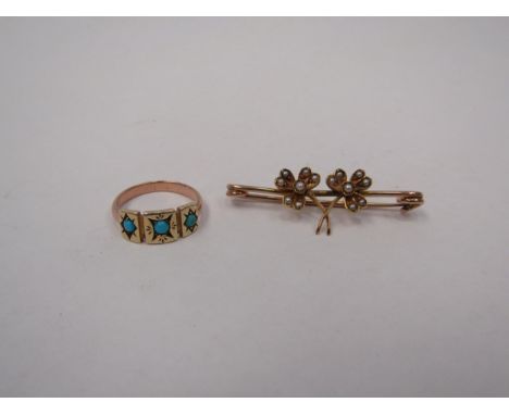 An unmarked gold ring, set with three turquoise 2.7g and an unmarked gold seed pearl brooch 3g 