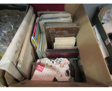 A quantity of cigarette cards and albums to include football examples, loose cards and a collection of Royal memorabilia 