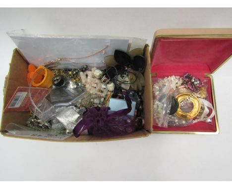 A box of assorted costume jewellery 