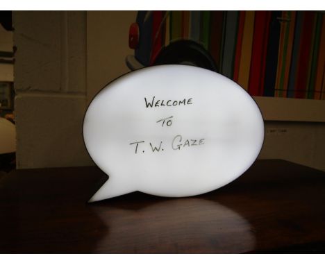 A light-up message box in the form of a speech bubble 