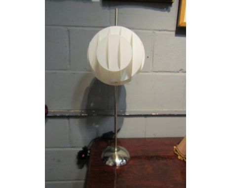 A modern chrome table lamp, globular form shade 