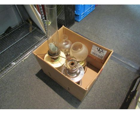 Three oil lamps a/f and a brass electric lamp (4) 
