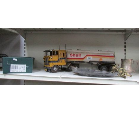 A mixed lot of metalware including model Shell tanker, door furniture, Lincoln imp door knocker etc.,