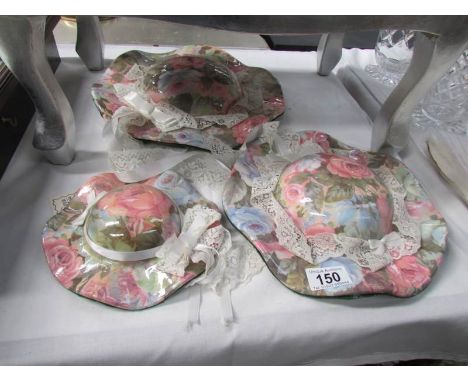 3 ceramic wall bonnets.